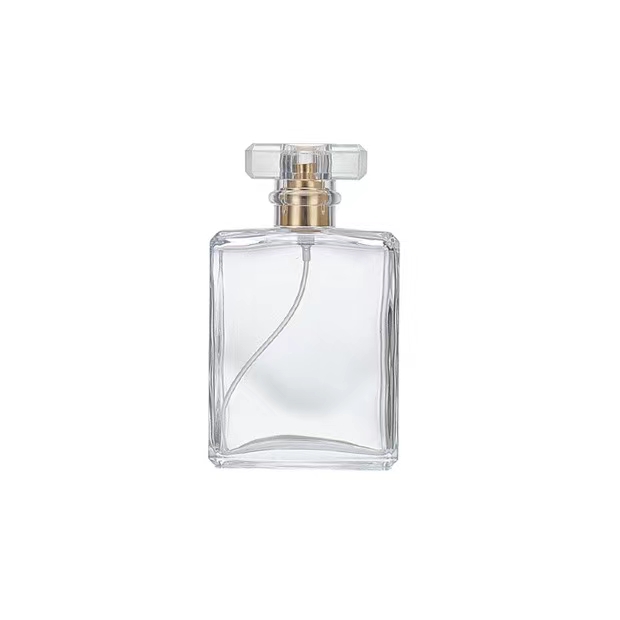 Bouteille de parfum en verre transparent de forme rectangulaire de 100 ml avec capuchon en acrylique 