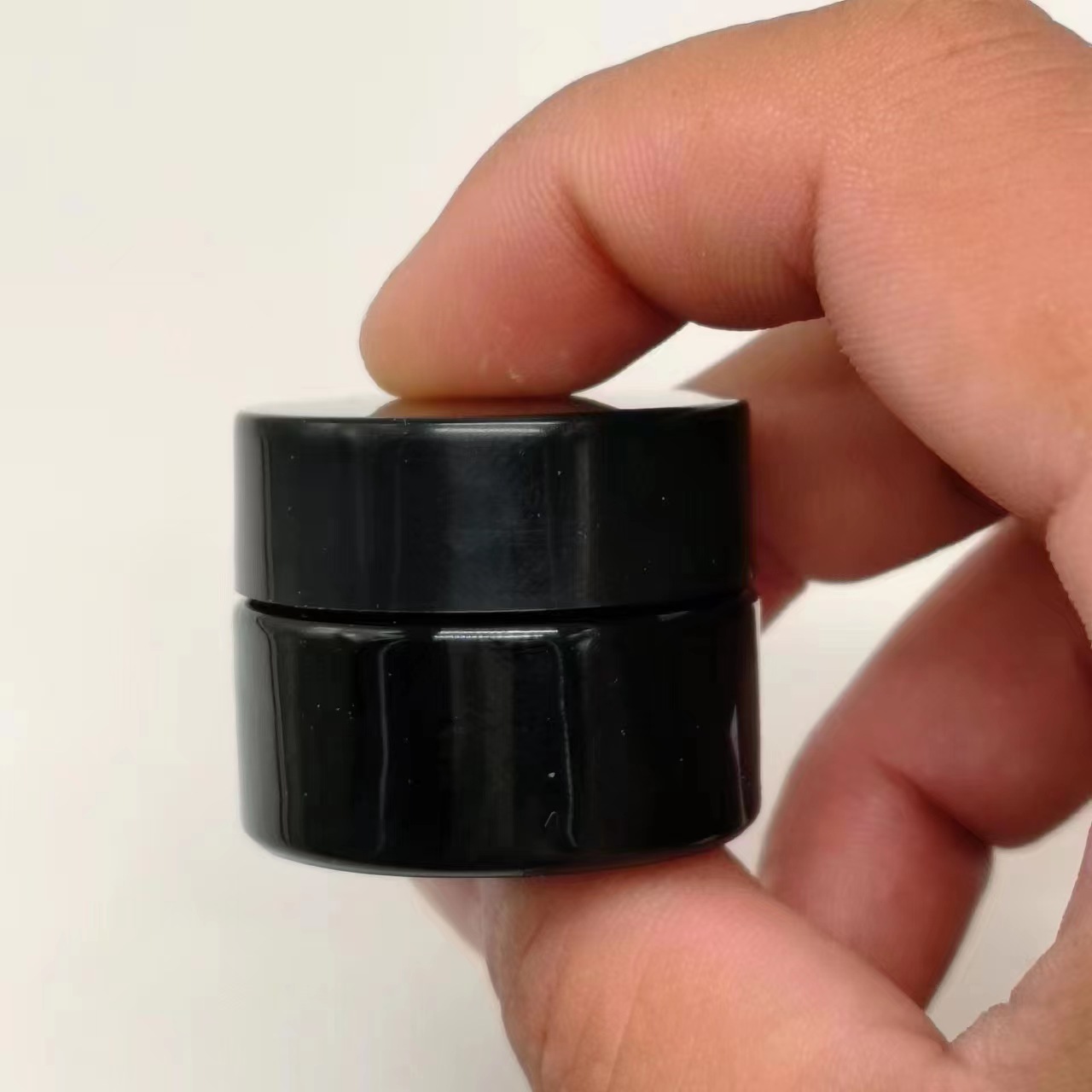 Pot de crème pour le visage en verre noir 30 g